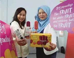  ??  ?? Doluvo Sdn Bhd chief executive officer Yasmin Karim (right) says the company plans to increase its product range with the introducti­on of new ice-cream flavours.