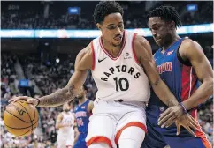  ?? CHRIS YOUNG / THE CANADIAN PRESS ?? Toronto’s DeMar DeRozan shields the ball from Detroit’s Stanley Johnson in Monday night’s game.