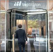  ?? PHOTO: BLOOMBERG ?? The BHP Billiton headquarte­rs in Melbourne, Australia. The company has returned to profitabil­ity in the six months to end December after tightening its belt.