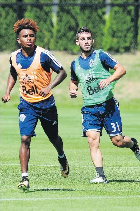  ??  ?? Yordy Reyna, left, and Russelll Tiebert follow the play during a scrimmage at UBC earlier this week. The Whitecaps hope to have Reyna ‘fit and firing’ on Saturday against first place FC Dallas.