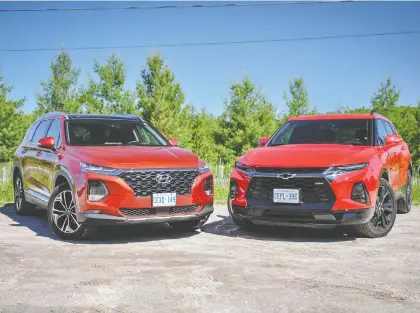  ?? NICK TRAGIANIS ?? The 2019 Hyundai Santa Fe, left, goes head to head with the reintroduc­ed 2019 Chevrolet Blazer.