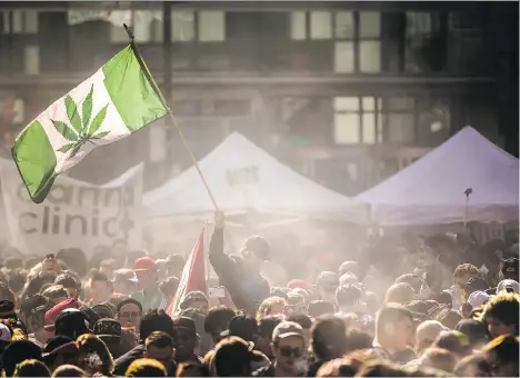  ?? MARK BLINCH/THE CANADIAN PRESS VIA THE ASSOCIATED PRESS ?? At least 13 cannabis-related companies have publicly listed on Canadian exchanges in the past year and seven more have announced their intention since the beginning of the year.