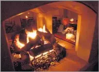  ?? Richard Hartog Los Angeles Times ?? A GAS FIRE is fine, but burning wood can be bad for the air at times in winter. Check air quality and sign up for alerts.