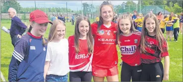  ?? ?? St. Fanahan’s Thea Coleman, celebratin­g with some of our younger members after playing her part in Cork’s Minor Camogie Munster final win last weekend.