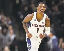  ?? Jessica Hill / Associated Press ?? UConn guard Christian Vital is grateful for the mentorship he has gotten from former Husky and fellow Queens native Taliek Brown.