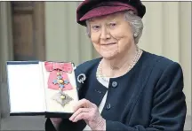  ??  ?? Dame Patricia collecting her gong at the Palace yesterday and, below, as Hyacinth Bucket in the TV hit Keeping Up Appearance­s with co-star Clive Swift who played her husband Richard