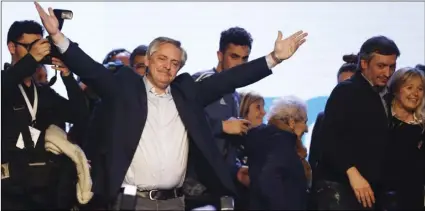  ??  ?? Presidenti­al candidate Alberto Fernandez addresses supporters at the “Frente de Todos” party headquarte­rs after primary elections in Buenos Aires, Argentina, on Sunday. AP PHOTO/SEBASTIAN PANI