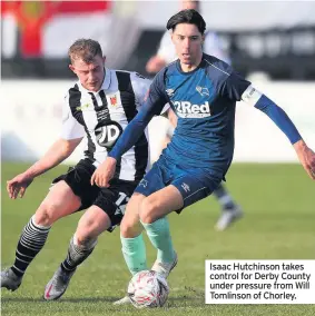  ??  ?? Isaac Hutchinson takes control for Derby County under pressure from Will Tomlinson of Chorley.