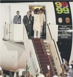  ??  ?? 0 Abdelbaset al-megrahi, second left, being greeted on his arrival in Tripoli on 20 August, 2009 after his release