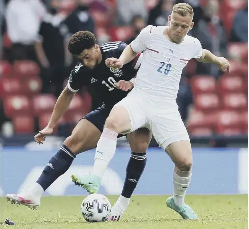  ??  ?? 0 Che Adams, left, was a surprise omission from the starting line-up against the Czechs and is a strong contender to face England