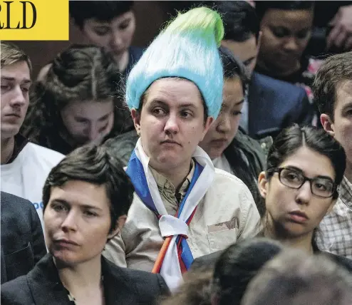  ?? ANDREW HARNIK / THE ASSOCIATED PRESS ?? An audience member dressed like a Russian troll doll sits in the gallery Tuesday as Facebook CEO Mark Zuckerberg testifies before a joint hearing of the Commerce and Judiciary Committees on Capitol Hill in Washington.