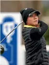  ?? GETTY IMAGES ?? Lydia Ko watches her tee shot on the 11th hole