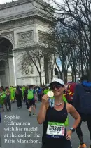  ??  ?? Sophie Tedmanson with her medal at the end of the Paris Marathon.