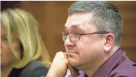  ?? POOL/RODNEY WHITE/THE REGISTER ?? Jason Carter listens at the Marion County Courthouse in a hearing in December 2018 on whether a $10 million wrongful death judgment against him should be overturned. The Iowa Supreme Court upheld the ruling.