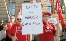  ?? — Reuters ?? Members of Canada’s Unifor union chant during a rally ahead of the third round of Nafta talks in Ottawa.