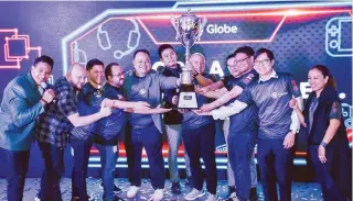  ??  ?? Globe President and CEO Ernest Cu (5th from left) with Mineski, Riot Games and Garena executives