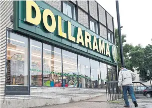  ?? PAUL CHIASSON THE CANADIAN PRESS FILE PHOTO ?? Dollarama reported its fourth-quarter profit rose compared with a year ago. The company was deemed an essential service and 54 of its 1,291 stores remain closed temporaril­y.