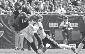  ?? MIKE DINOVO/USA TODAY SPORTS ?? Bears wide receiver Allen Robinson makes a touchdown catch against the Bengals on Sunday in Chicago.