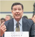  ??  ?? When Trump met FBI director James Comey, Frum describes it as the “first encounter with cops he could not buy.”