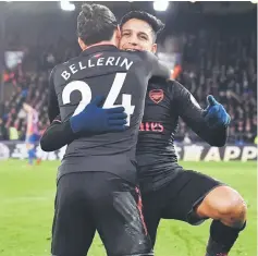  ??  ?? Alexis Sanchez (right) celebrates after scoring their third goal with Arsenal’s Spanish defender Hector Bellerin during the English Premier League football match between Crystal Palace and Arsenal at Selhurst Park in south London. — AFP photo