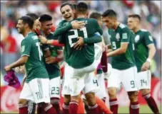  ?? MATTHIAS SCHRADER - THE ASSOCIATED PRESS ?? Mexico players celebrate after winning the group F match between Germany and Mexico at the 2018 soccer World Cup in the Luzhniki Stadium in Moscow, Russia, Sunday. Mexico won 1-0.