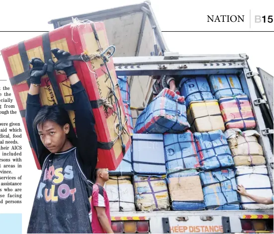  ?? PHOTOGRAPH BY KING RODRIGUEZ FOR THE DAILY TRIBUNE ?? WITH Valentine’s Day just around the corner, boxes of flowers from Benguet province are being unloaded at the Dangwa Flower Market in Manila on Monday morning.