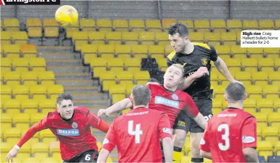  ??  ?? High rise Craig Halkett bullets home a header for 2-0