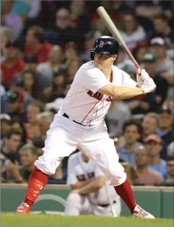  ?? File photo by Louriann Mardo-Zayat / lmzartwork­s.com ?? Red Six shortstop Brock Holt belted a two-run home in the ninth inning Saturday afternoon, but it wasn’t enough, as first-place Boston suffered an 8-5 defeat to the Yankees at Fenway Park.