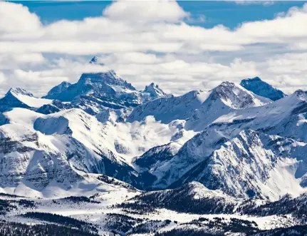  ?? ?? Clockwise from above: Banff National Park, Alberta, Canada; skier using a training app; Courchevel in the French Alps