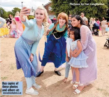  ?? ?? Buy copies of these photos and others at:
www.baylismedi­aphotos.co.uk
Pictures by: Ian Longthorne
Selfie time with a pair of Disney-inspired princesses. Ref:134748-38