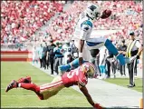  ?? (AP) ?? Carolina Panthers quarterbac­k Cam Newton (1) is tackled by San Francisco 49ers safety Eric Reid (35) during the second half of an NFL football game in Santa Clara,
California on Sept 10.