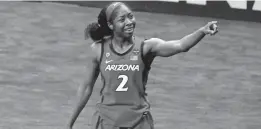  ?? ERIC GAY/AP ?? Arizona’s Aari McDonald celebrates after the semifinal win against Connecticu­t on Friday at the Alamodome in San Antonio.