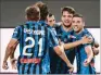  ?? (AFP) ?? Atalanta’s German defender Robin Gosens (right) celebrates after scoring against Napoli at the Atleti Azzurri d’Italia stadium in Bergamo on Thursday.