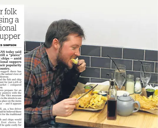  ??  ?? Andy Truscott, left, and Sion Parkinson tuck into fish and chips at the Tailend.