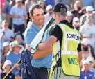  ?? ROB SCHUMACHER-USA TODAY SPORTS ?? Scottie Scheffler smiles at his caddie Ted Scott after winning the Phoenix Open.