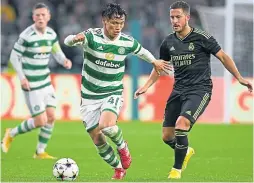  ?? ?? Reo Hatate evades Real Madrid’s Eden Hazard at Celtic Park