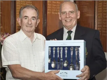  ??  ?? Runner up in the 2017 Baltinglas­s Golf Club captain’s prize, Sean O’Connor, is presented with his prize by Club Captain Louie Fagan.