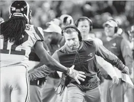  ?? Wally Skalij Los Angeles Times ?? COACH SEAN McVAY celebrates a touchdown with Watkins against the 49ers. Watkins had six catches for 106 yards and scored two touchdowns.