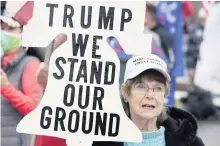  ??  ?? A supporter of US president Donald Trump at the rally at Freedom Plaza, Washington DC