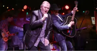  ?? Jason Kempin/Getty Images ?? Meat Loaf and country artist John Rich perform at Redneck Riviera Nashville in March.