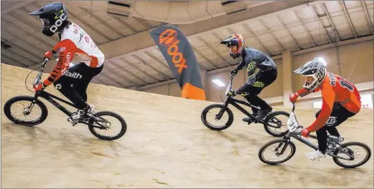  ?? Patrick Connolly ?? BMX riders negotiate a steep turn during the USA BMX 2017 Las Vegas Nationals at South Point Arena on Sunday. Las Vegas Review-journal @Pconnpie