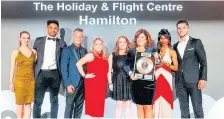  ??  ?? Flying high Pop star Sinitta presents Roseann and the team with the Travel Agent of the Year for Northern UK covering Scotland, Northern Ireland and the north of England