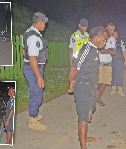  ?? Photo: ?? Police at Reservoir Road Check point in Suva detained three people, who were found allegedly walking around during the curfew hours on April 1, 2020.