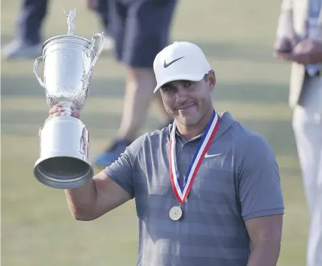  ?? EPA ?? Brooks Koepka celebrates at Shinnecock Hills on Sunday night after clinching his second US Open title