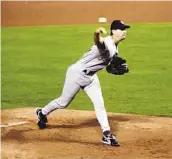  ?? CRAIG JONES GETTY IMAGES ?? Kevin Brown, pitching against the Braves in Game 2 of the NLCS, helped Padres reach 1998 World Series.