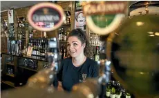  ??  ?? Iona Betts, who works at Bailie’s Bar in Colombo St, says life in the St Albans part of Colombo St is more like living in a village.
