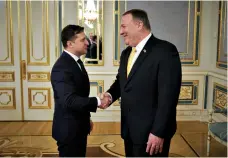  ?? Associated Press ?? ■ Ukrainian President Volodymyr Zelenskiy, left, and U.S. Secretary of State Mike Pompeo shake hands during their meeting Friday in Kyiv, Ukraine.