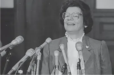  ?? Bob Child/Associated Press ?? Chief Justice Ellen Ash Peters smiles as she conducts a news conference at the Connecticu­t Supreme Court, Nov. 13, 1984, in Hartford, Conn. Peters, the first woman to serve as Connecticu­t's chief justice and wrote the majority opinion in the state Supreme Court's landmark school desegregat­ion ruling in 1996, died Tuesday. She was 94.