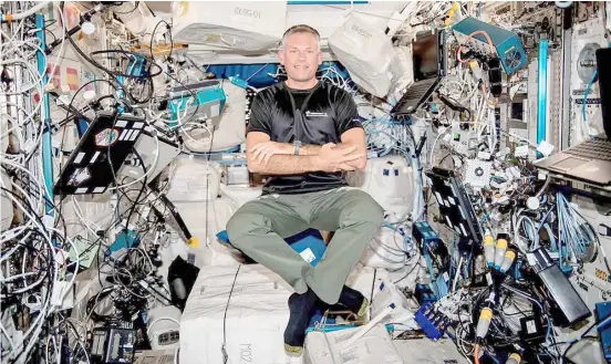  ?? PHOTOGRAPH COURTESY OF NASA ?? Back to Earth Danish astronaut Andreas Mogensen has arrived safely on Earth after spending six months in space. At the space station, Mogensen worked on various research projects, testing a Danish invented filter for waste water in space to allow future astronauts to recycle sewage.