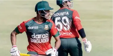  ?? Agence France-presse ?? ↑
Bangladesh’s batsmen Mohammed Naim (left) and Soumya Sarkar scramble for a run during the first Twenty20 match on Thursday.